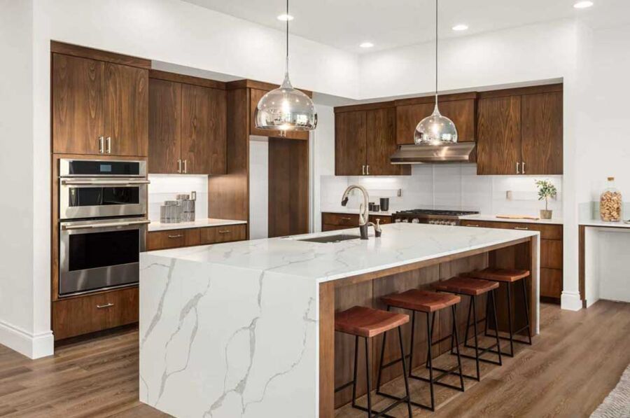 Double Wall Ovens, Berkeley — A stacked double wall oven squared into its cabinet, fastened at the manufacturer's screw points and run through a full heat cycle.